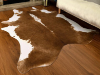 August Grove&reg; Christann Faux Cowhide Animal Print Indoor Rug, Novelty 5'2" x 6'3" $299