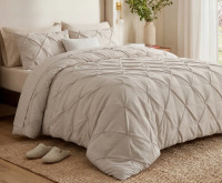 Bedsure 7-Piece Cal-King Pintuck Bed-in-a-Bag- Beige Pinch Pleat Comforter with Sheets, Pillowcases & Shams $299