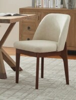 Winston Porter Bason Faux Leather Upholstered Dining Chair $299