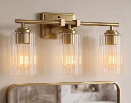 BYBLIGHT 17.7 in. 3-Light Modern Brushed Gold Bathroom Vanity Light Fixture with Clear Ribbed Glass Shade Over Mirror New In Box $299