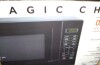 Magic Chef 0.7 cu. ft. 700-Watt Countertop Microwave in Black On Working $199 - 2