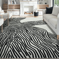 Wrought Studio&trade; 5' x 7' Modern Abstract Stripes Machine Washable Area Rug in Black & White $399