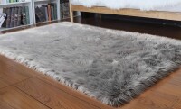 Everly Quinn Glendine Faux Sheepskin Indoor Rug, 4'5" x 3' $199