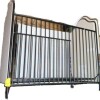 Ameriwood Little Seeds Piper Upholstered Convertible Metal Crib in Black and Cream, New Floor Model $399.99 - 2