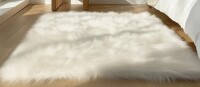 Everly Quinn Haja Fluffy Faux Sheepskin Fur Shag Area Rug in White, Rectangle 4' x 6' $199